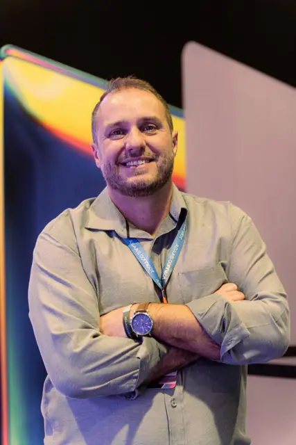 Retrato de integrante da equipe da Hosanna no evento
